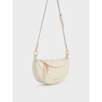 ราคา Charles & Keith กระเป๋าสะพายข้างทรงพระจันทร์ครึ่งเสี้ยวดีไซน์ลายย่นรุ่น Philomena - สีครีม