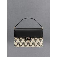 ราคา Charles & Keith กระเป๋าสะพายไหล่ดีไซน์หนังแท้ และผ้าแคนวาสลายโมโนแกรม - สีดำ