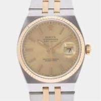 ราคา Rolex Champagne 18k Yellow Gold And Stainless Steel Datejust 17013 Quartz Men's Wristwatch 36 mm (715402)