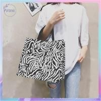 ราคา กระเป๋าผ้าแคนวาส ลายม้าลาย คลื่น ลายเสือดาว จุของได้เยอะ ขนาด A4 (12575847814)