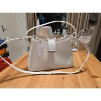 ราคา กระเป๋าสะพายข้าง Charles Keith Lola Belted Hobo Bag Cream สีขาวครีมอะไหล่เงินไม่เคยใช้ ป้าย Tag ยังไม่ได้แกะ (29100776783)
