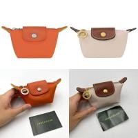 ราคา กระเป๋าใส่เหรียญ Longchamp Le Pliage Green Coin purse สี Carot ช็อปคิง (22059897350)