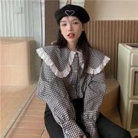 ราคา ดีไซน์เก๋สไตล์ฝรั่งเศสเสื้อเชิ้ตผู้หญิงรุ่นใหม่เสื้อเชิ้ตฤดูใบไม้ผลิสีขาว2023คอตุ๊กตาคอปกลูกไม้ Curz (29106420201)