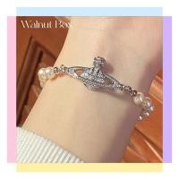 ราคา คุณภาพสูง สร้อยข้อมือ ประดับไข่มุก ดาวเสาร์ สร้อยข้อมือ ประดับไข่มุก เข้ากับทุกการแต่งกาย แบบหรูหรา (25319901569)