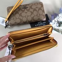 ราคา กระเป๋าตังค์coach ใบยาว COACH LONG ZIP AROUND WALLET IN SIGNATURE CANVAS COACH C4452 (10743901734)
