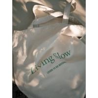 ราคา Hot Item Tote and Co Living Slow canvas tote bag ตัวหนังสือเขียว กระเป๋าผ้า น่ารัก ซักได้ สกรีนไม่ลอก ลายเรียบ มินิมอล (25780001465)