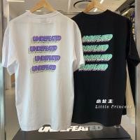 ราคา Undefeated เสื้อยืดแขนสั้น คอกลม พิมพ์ลายโมโนแกรม ทรงหลวม (23915704289)