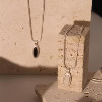 ราคา ใช่ พร้อมสต็อก2023ใหม่สไตล์น้ําหยดจี้สีดํานิลแมวตาสร้อยคอหญิงยุโรปอเมริกันแสงหรูหราซอกใหม่จีนเคลือบกระดูกไหปลาร้าโซ่ (24784862990)