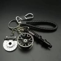 ราคา ชิ้นส่วนรถยนต์ พวงกุญแจของขวัญคนรักรถสปอร์ตพวงกุญแจรถธีมของสะสม สีดําเทอร์โบเกียร์เงินขอบยางสีรุ้งแผ่นดิสก์เบรคสีแดงโช้คอัพสปริงสีแ (29536508506)