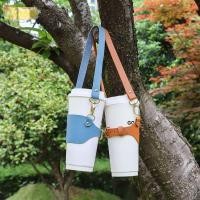 ราคา สายรัดที่วางแก้ว SEEO สายรัดผู้ให้บริการถ้วยน้ําหนัง PU ที่หุ้มฉนวนด้วยความร้อน สลิงขวดน้ําพกพาแบบมือถือสําหรับเดินทาง (46700657534)