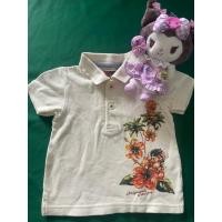 ราคา เสื้อคอโปโลแขนสั้น สกรีนลายดอกไม้ ของเด็กมือสอง สีครีม Size 80 งานป้ายของแท้ สภาพ 90 (29158467522)
