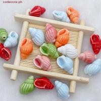 ราคา CODECOVE 10ชิ้นหอยสังข์ลูกปัด งานฝีมือทําด้วยมือเซรามิกเซรามิก ตัวเว้นวรรค หลวมลูกปัด น่ารักสีสดสร้อยคอต่างหูอุปกรณ์ ทําเอง เครื่องประดับทําวัสดุผู (41024477107)