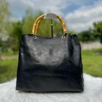 ราคา กระเป๋าหนังแท้สีดำ หูจับเป็นไม้ไผ่ (57550201102)