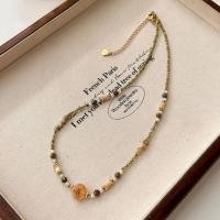 ราคา สร้อยคอลูกปัดคริสตัลสีเขียวและหินธรรมชาติ ทำจากเหล็กไทเทเนียม (41122873815)