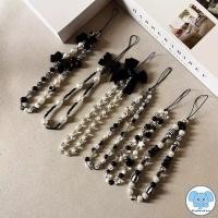 ราคา เชือกคล้องโทรศัพท์มือถือสีดำสุดหรูหราพร้อมโบว์ลายการ์ตูนสุดหรูหราพร้อมจี้คริสตัลมุกหลากสีสันและสร้อยข้อมือมุก (27226171117)