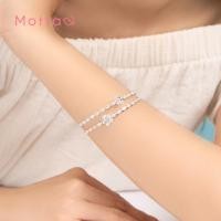 ราคา Motta Pearl Ribbon Bangle กำไลข้อมือชุบทองคำขาว 2 เลเยอร์ ดีไซน์ดอกไม้คู่สุดหวาน (41713901253)