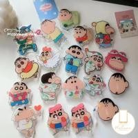 ราคา Kawaii การ์ตูนตลก ชินจัง ที่จับโทรศัพท์มือถือ อุปกรณ์เสริมโทรศัพท์มือถือ เกาหลี Griptok สากล ปรับขนาดได้ ขาตั้งโทรศัพท์ (23049732631)