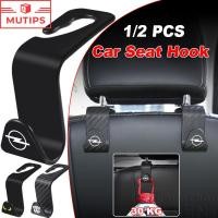 ราคา Opel ตะขอรถยนต์ ตะขอด้านหลังที่นั่งรถ ซ่อนเร้น Hanger Holder ที่แขวนในรถยนต์ เหมาะสำหรับ Corsa Vectra Astra g H J K Insignia Vivaro Zafira Mokka (24397745074)