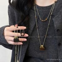 ราคา กระเป๋าหินตาเสือและสร้อยคอมากำลัง (42470429659)