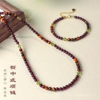 ราคา สร้อยข้อมือและสร้อยคอนาทีราวกะโกเมนสีเหลืองพร้อมลูกปัดเสือตา สำหรับผู้หญิง ชุด ACCESSORY (41412062414)