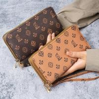 ราคา กระเป๋าสตางค์ซิปสองชั้นมีพื้นที่กว้างขวางสำหรับผู้หญิง ออกแบบตามสไตล์ยุโรปและอเมริกา ใส่มือถือและเหรียญได้อย่างสะดวก (50650103335)