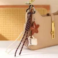 ราคา สตาร์ไซเวย์ พวงกุญแจขนมปังกาแฟ เชือกถักกระเป๋าหนังเสน่ห์ สร้างสรรค์ด้วยจี้ดาวพวงกุญแจเชือกถักแฮนด์เมด (51802557058)