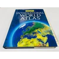 ราคา มือสอง จุดน้ำตาลหลังปก ปกแข็ง เล่มใหญ่ หนา หนังสือแผนที่โลก Philip s International World Atlas 480 บาท (52251101723)