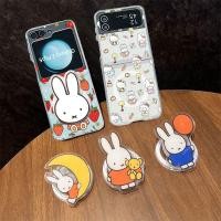 ราคา Samsung Z Flip 6 5 4 3 การ์ตูนน่ารัก Sanrio Hello Kitty Miffy Hard Magnetic Clear Case Magnect ที่วางโทรศัพท์สําหรับ Samsung Z Flip 3 4 5 6 กันกระแทกพร้อมขนมปังสายคล้องโทรศัพท์ (29327455916)