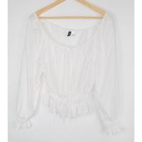 ราคา เสื้อแขนยาวสีขาว H M มือ 2 ชายเสื้อลูกไม้ แขนระบาย คอกว้าง Size XXS อก 34 38 นิ้ว ยาว 21 นิ้ว (55200144781)