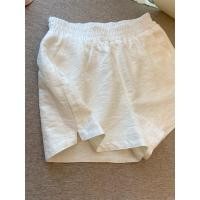 ราคา กางเกงขาสั้นสปอร์ตระบายอากาศสีขาวเอวสูงคลาสสิกของผู้หญิง (27161947124)