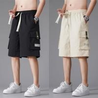 ราคา กางเกงขาสั้นผู้ชายทรงหลวมเอวยางยืด มีหลายกระเป๋าและเชือกผูก สไตล์สตรีทสำหรับชุดลำลอง (45057198798)