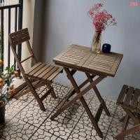 ราคา โต๊ะทานอาหารพับได้ไม้เนื้อแข็ง ระเบียง โต๊ะสวนชาทรงสี่เหลี่ยมพร้อมเก้าอี้ สไตล์เรโทร โต๊ะกาแฟทรงกลมแบบสบายๆ ทำจากไม้ (51652002883)