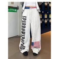 ราคา กางเกงวอร์มทรงหลวมลำลองสไตล์แจ๊สแดนซ์ พิมพ์ลายธงชาติและตัวอักษรแบบเรโทรอเมริกัน ดีไซน์แบบขาดๆ พร้อมขอบเอวสองชั้น (55356685617)