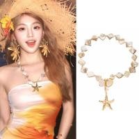 ราคา สร้อยคอสไตล์ชายหาดสำหรับผู้หญิง ดีไซน์เปลือกหอยและปลาดาว พร้อมโซ่กระดูกงาช้าง (46406700250)