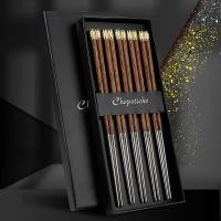 ราคา 304 สแตนเลส เวนจ์ ไม้ไม้จันทน์สีแดงหัวทองแดงตะเกียบร้านอาหารโรงแรมร้านอาหารสาธารณะตะเกียบเกลียว ฉ (40929768909)