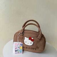 ราคา kitty กระเป๋าถือสีน้ำตาลลายคิตตี้มีสายยาวของแท้พร้อมส่ง (43929332229)