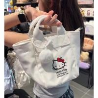 ราคา กระเป๋าถือ ถุงผ้าถือ กระเป๋าผ้า คิตตี้ ปัก สีขาว มีแท็กเป็นขนปุยๆ Kitty Sanrio ลิขสิทธิ์แท้ (28481537985)