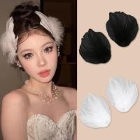 ราคา เฟยซี กิ๊บขนนกสีขาวดำ สำหรับบัลเล่ต์และสวมใส่ทุกวัน อุปกรณ์เสริมเต้นรำและบทบาทการแสดง (53955623271)