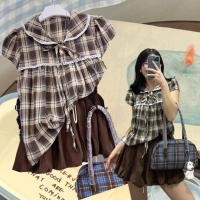 ราคา plaid top เสื้อคอบัว แต่งลูกไม้ที่ขอบ กระดุมหน้า แต่งโบว์ ลาย plaid น่ารักมาก ผ้ามี texture (40626804492)