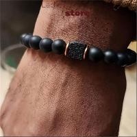 ราคา สร้อยข้อมือชาย หินลาวาและนิล ปรับไซส์ได้ ยืดหยุ่นมี charm (47859333540)