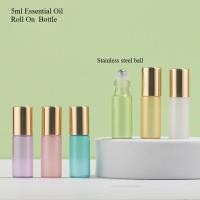 ราคา น้ํามันหอมระเหย 5มล แก้วที่มีสีสันม้วนบนขวดน้ําหอมลูกเหล็กลูกกลิ้งรีฟิลตัวอย่างฝาทอง (29735300842)