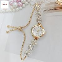 ราคา นาฬิกาข้อมือสำหรับผู้หญิง ฝังเพชร ลายดอกไม้ ยืดได้ สไตล์หรูหรา (45859361278)