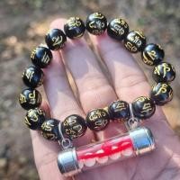 ราคา กำไลมงคลสีดำลายยันต์ พร้อมตะกรุดข้อมือด้ายแดง ครูบาบุญชุ่ม ญาณสํวโร วัดพระธาตุดอนเรือง ประเทศพม่า (52254807932)