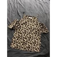 ราคา เสื้อเปิดไหล่ มือสอง อก32 34 สายเดี่ยว ลายเสือ (41080446381)