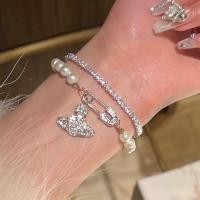 ราคา 2024 สร้อยข้อมือมุกดาวเสาร์ดาวเคราะห์หญิงแสงหรูหราเพชรเต็มสร้อยข้อมือเพทาย (24923963481)