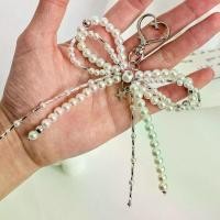 ราคา โซ่ Guban, DIY สองชั้น, ตกแต่งมุกโบว์, ดีไซน์ดาวน้อย, กระเป๋า จี้ โซ่โทรศัพท์ สไตล์ Ins สุดฮอต crochet kit set เหรียญ โปรยทาน จาก ลวด มะ หยี่ เซ็ต ไล ลูกปัด กํา สร้อย ลูก ปัด (1731313481914549251)