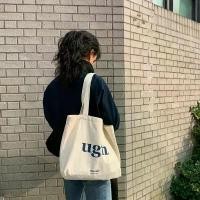 ราคา กระเป๋าผ้าแคนวาส สไตล์เกาหลี ชิค ฮาราจูกุ สีพื้น สำหรับผู้หญิง ศิลปะ อเนกประสงค์ เหมาะสำหรับหนังสือ กระเป๋าผ้าแคนวาสสาวญี่ปุ่น (1729976567983278683)