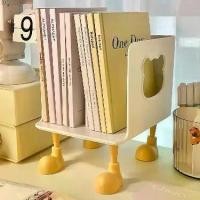 ราคา ชั้นวางหนังสือเดสก์ท็อป ดีไซน์เรียบง่าย พกพาสะดวก เหมาะสำหรับนักเรียนและสำนักงาน ที่วางหนังสือแบบตายตัว ที่วางหนังสือ ชั้นวางของกระจุกกระจิก ใหม่ในปี 2024 ที่วางหนังสือ (1730787763916998872)