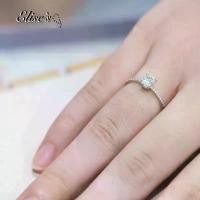 ราคา Elise''s ER-1076 แหวนเพชร CZ เกรดพรีเมี่ยมหน้าเพชรขนาด 0.5 กะรัต พร้อมเพชรประดับข้าง งานเกาหลีแท้ แหวนมินิมอล (1731782154206218050)