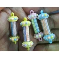 ราคา (100ชุด)ฝาตะกรุดลายดอกพิกุลลงยาประกอบตะกรุดยันต์5แถวลงยาหลากสีขนาด10มิล (1731696133497653031)